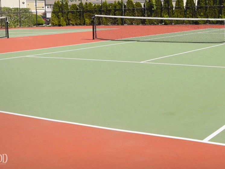 Tennis courts in the sun at Heatherwood House at Ronkonkoma, New York